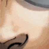 a close up of a person 's face with a nose ring on it .