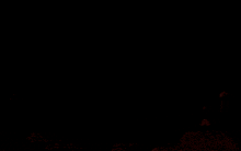 a cartoon character is standing on top of a hill in front of a large red sun
