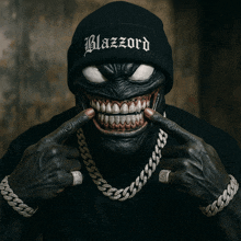 a man wearing a black beanie that says blazzard