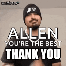 a man wearing a beanie and a necklace is giving a thank you speech .
