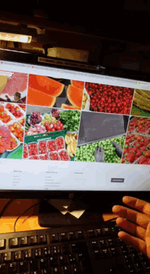 a computer screen displays a collage of fruits and vegetables