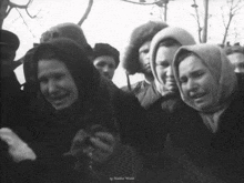a black and white photo of a group of people with the words markus world below them