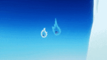 a blue sky with two flame shaped clouds