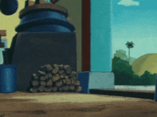 a pile of logs sits on a wooden table in front of a window