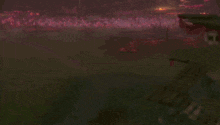 a group of monsters are fighting each other in a video game in a dark forest .