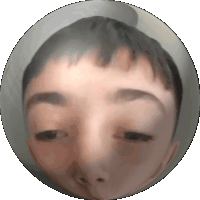 a close up of a person 's face with their eyes closed in a circle