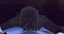 a man in a suit and tie is laying on his back
