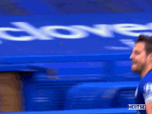 a blurry picture of a man in a blue jersey with the number 2 on it