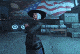a woman standing in front of an american flag
