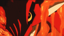 a close up of a cartoon character 's face with flames coming out of it 's mouth