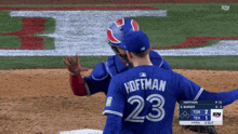 a baseball player with the number 23 on their back
