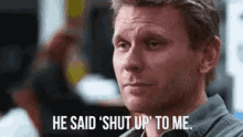 a man is making a funny face and saying `` he said shut up to me '' .