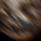 a blurred image of a dark brown background