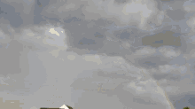 Over The Rainbow Green Fields GIF - Over The Rainbow Green Fields Gray Sky GIFs