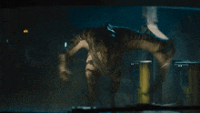 a monster is crawling through a dark room with a yellow pipe in the background