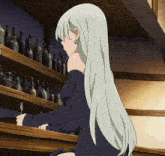 a woman with long white hair is sitting at a bar