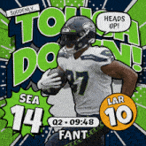 seahawks running back lar fant runs with the ball in his hands