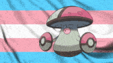 a transgender flag with a mushroom and a pokeball on it