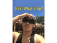 a man wearing sunglasses and a hat with the words hey what 's up behind him