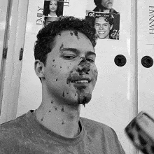 a black and white photo of a person with emily written on the wall behind them