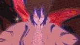 a pixelated image of a person with a red cape covering their face