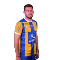 a man is wearing a blue and yellow uniform with the word uno on it