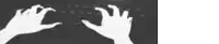 a person is typing on a keyboard with their hands .