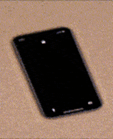 a cell phone with a picture of a woman on it and the word dilek on the screen