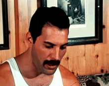 Freddie Mercury Queen GIF - Freddie Mercury Queen Grabs A Drink GIFs