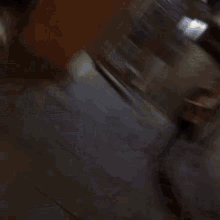 a person standing in front of a no smoking sign in a store