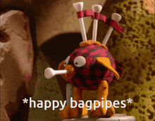 a picture of a stuffed animal that says happy bagpipes on it