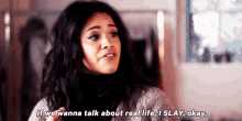 a woman is talking about real life and says `` if we wanna talk about real life , i slay okay . ''