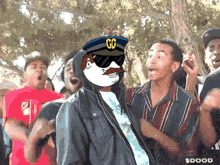 a cartoon character with a hat that says cc on it