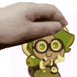 a cartoon character wearing glasses and a backpack is being propped up by a hand .