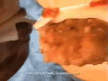 a close up of a mcdonald 's chicken nugget with a blurred background