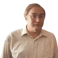 a man wearing glasses and a white striped shirt