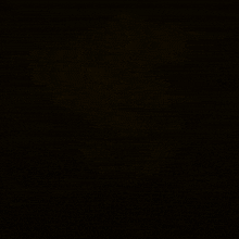 a blurred image of a logo with the letter s in the center