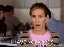 a woman says i have no words in front of a crowd