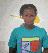 a girl wearing a blue nike shirt with a stick figure on it