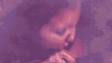 a close up of a woman 's mouth with her mouth open