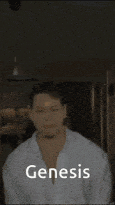 a man in a white shirt is standing in front of a sign that says genesis on it
