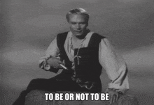a man sits on a rock with the words to be or not to be written below him