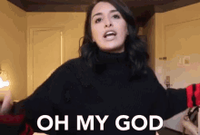 a woman in a black sweater is saying " oh my god "