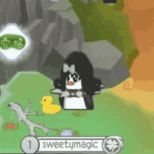 a penguin is standing next to a yellow duck in a game .
