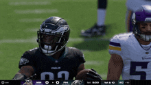 a football player wearing a jersey that says eagles