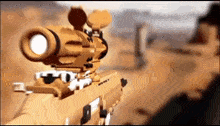 a sniper rifle with a scope on it