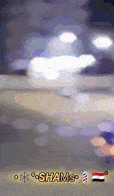 a blurred image with shams written on the bottom