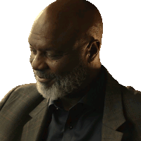 a man with a beard wearing a suit and a blue shirt