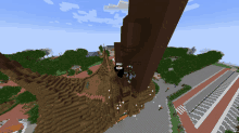 an aerial view of a minecraft world with a few players standing on a tree