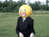 a man with a smiley face on his head